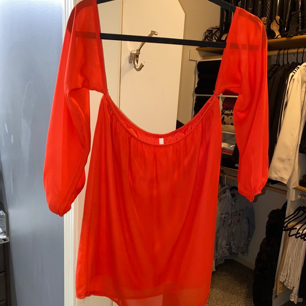 Red off the shoulder shirt